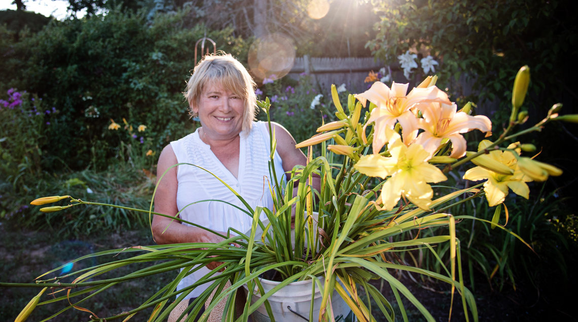 garden portrait of woman and lilies